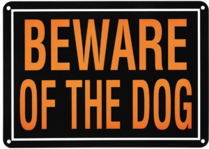 Sign with words "beware of the dog"