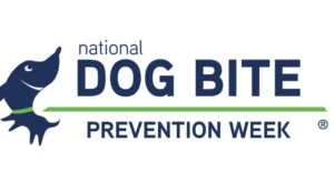 Sign pertaining to national dog bite prevention week